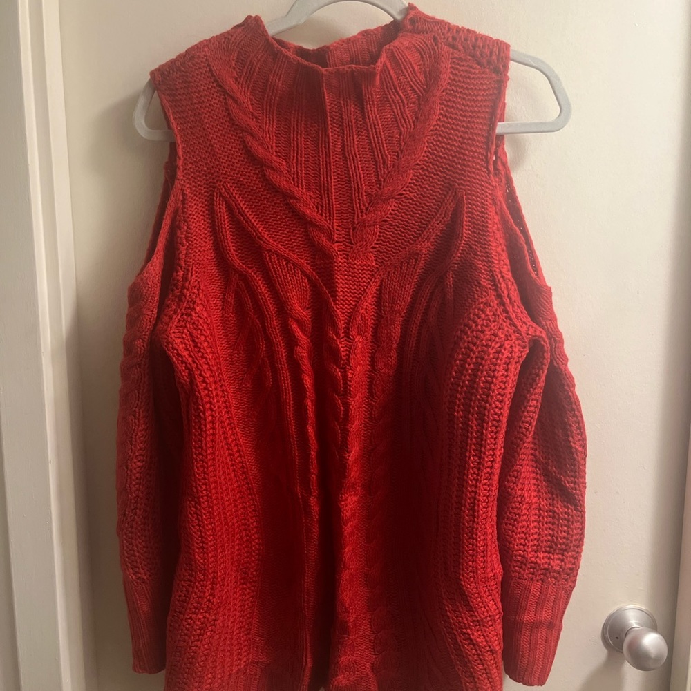Cold shoulder high neck cable knit sweater